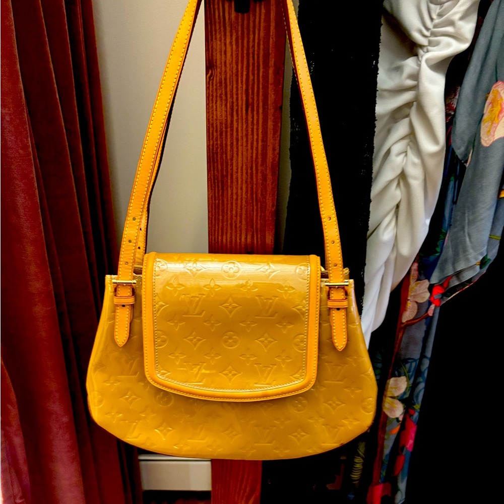 Louis Vuitton patent leather handbag.
